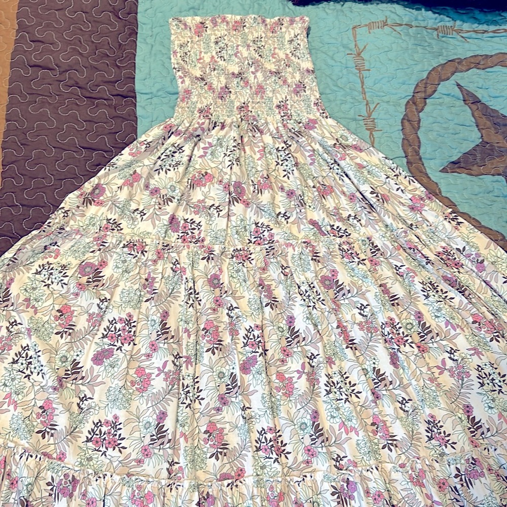 Strapless ankle length sun dress.